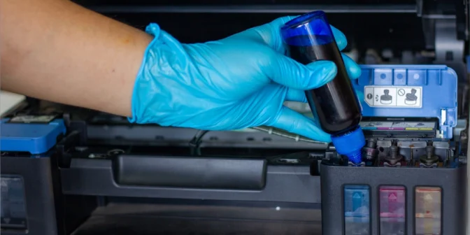 mengisi tinta printer